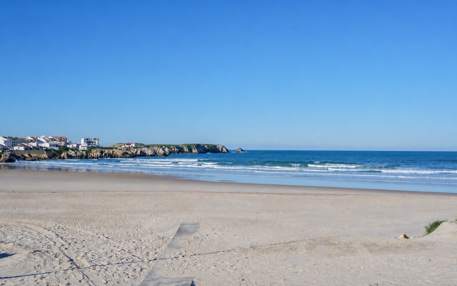 Beginner surfers learning in the water on the Peniche coast