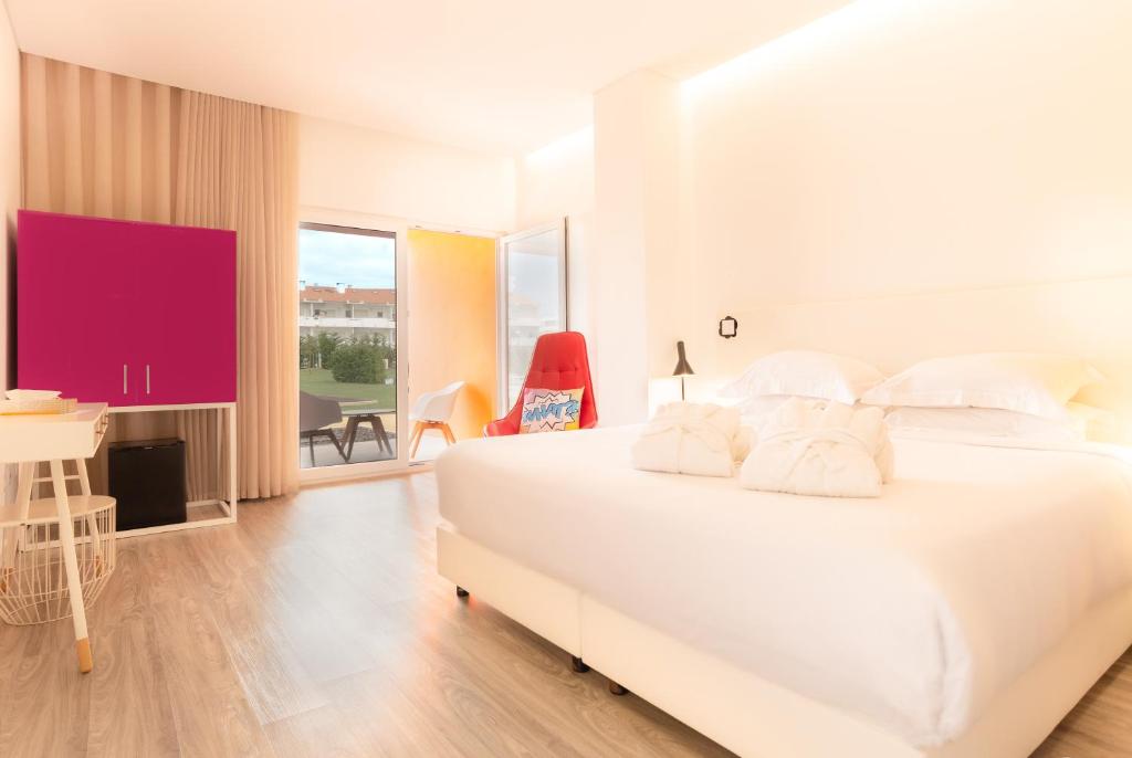 Guest bedroom at RIDE Surf Resort and Spa